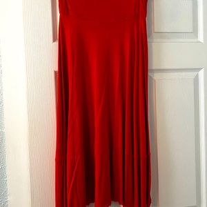 Bright red/orange skirt, Size L.